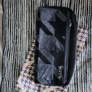 L. A. M. B. Black calf hair clutch